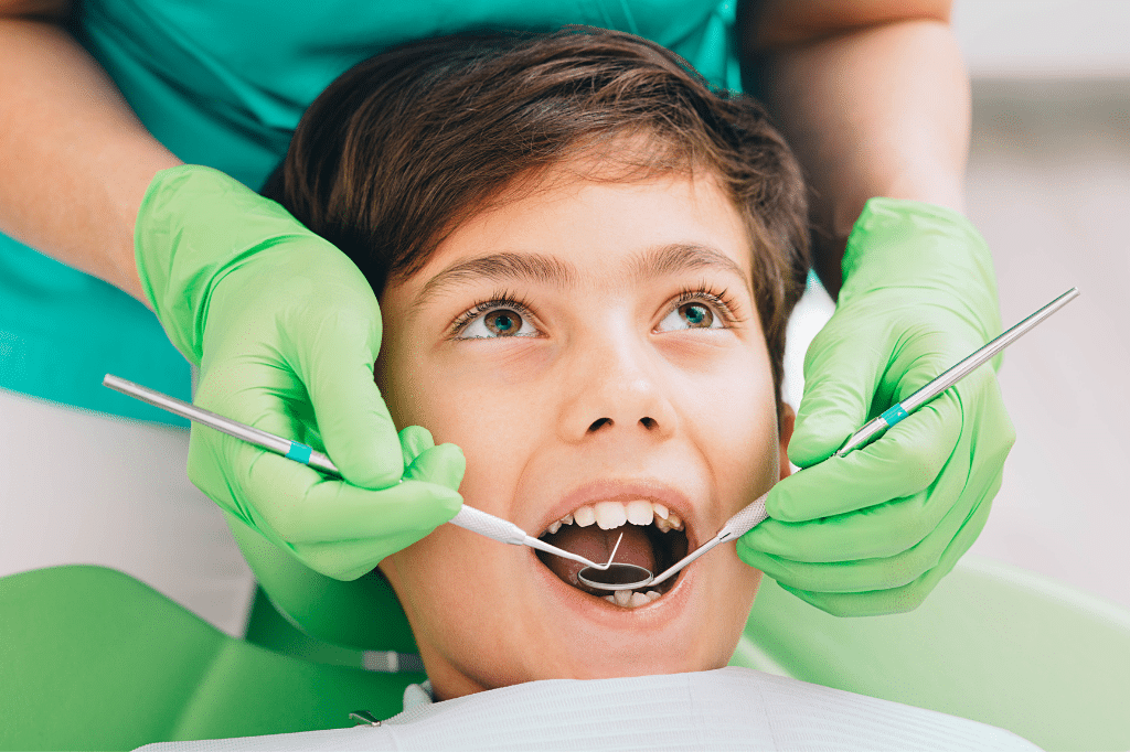 Child at dentist office getting an exam.